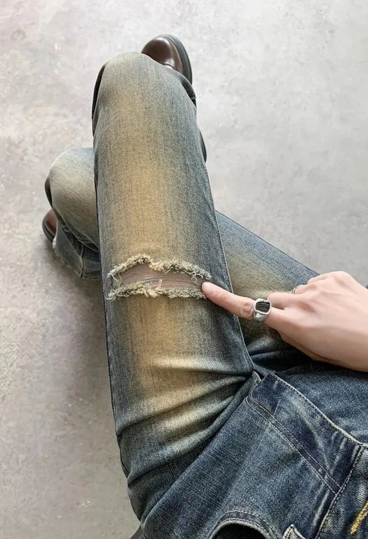 bleached holes flare jeans