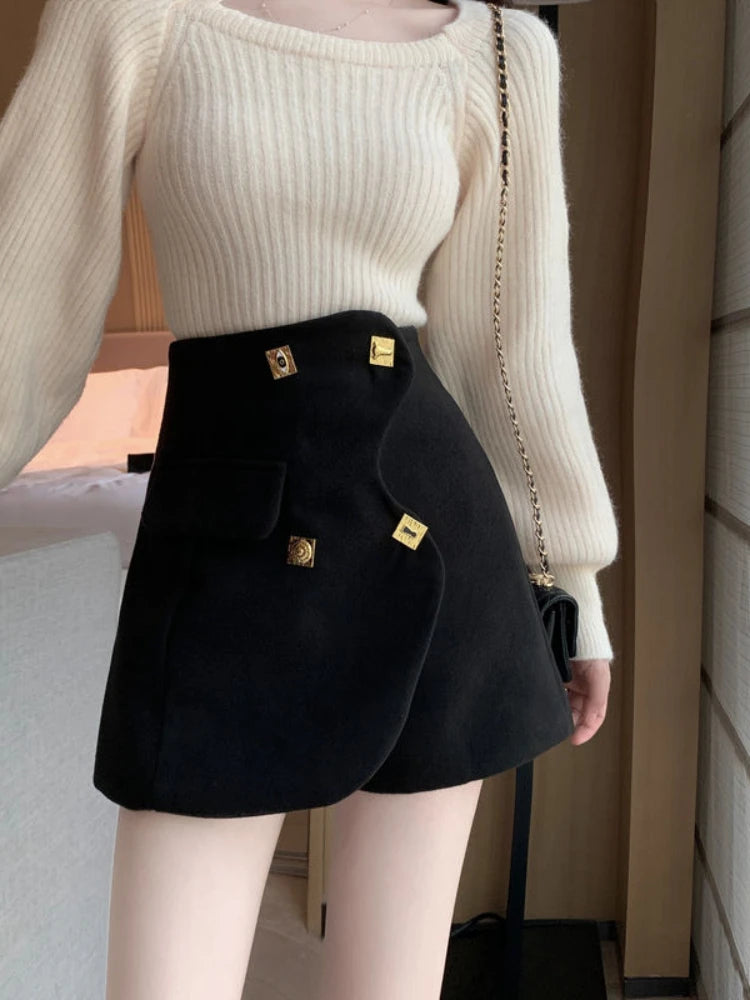 asymmetrical golden buttons shorts