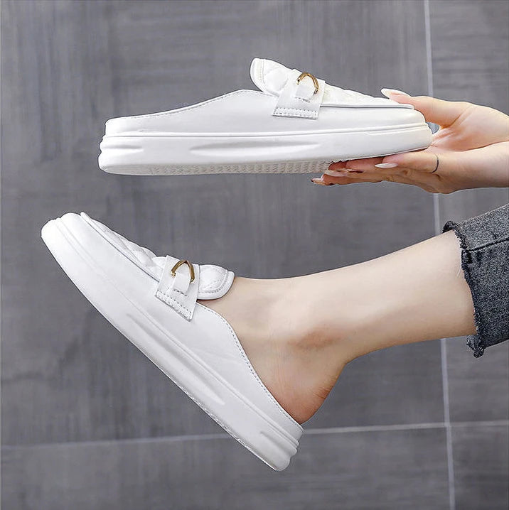 white flat leather slippers