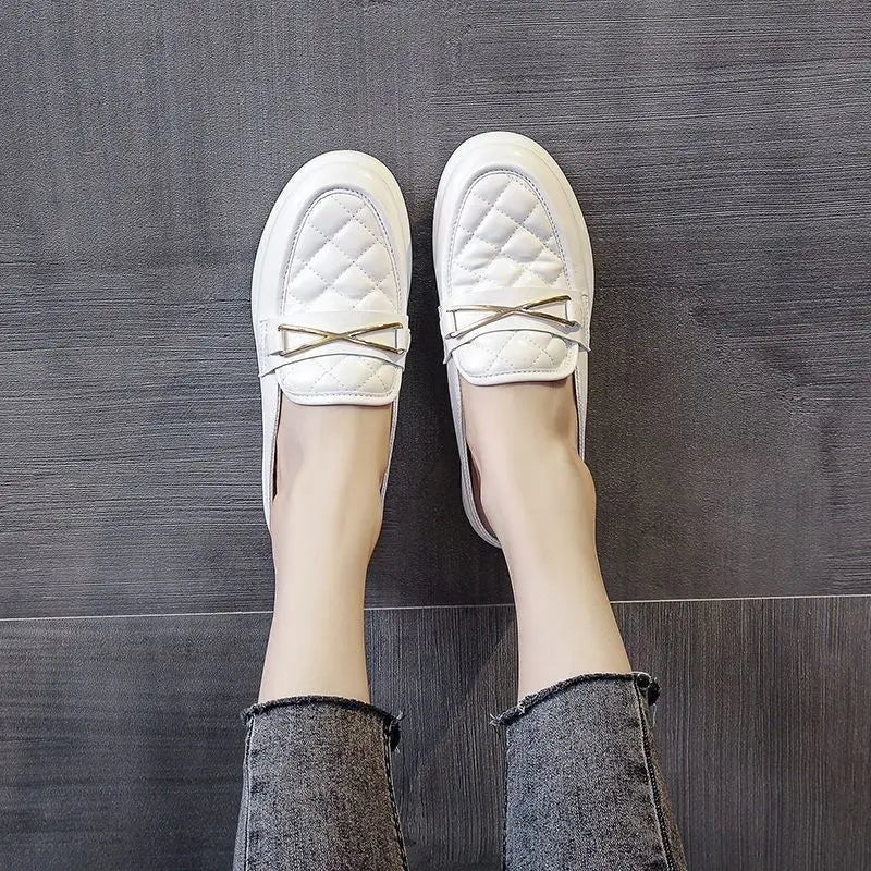 white flat leather slippers