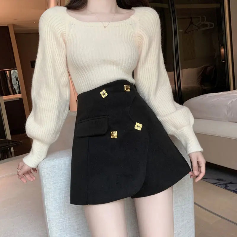 asymmetrical golden buttons shorts