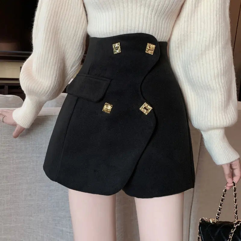 asymmetrical golden buttons shorts