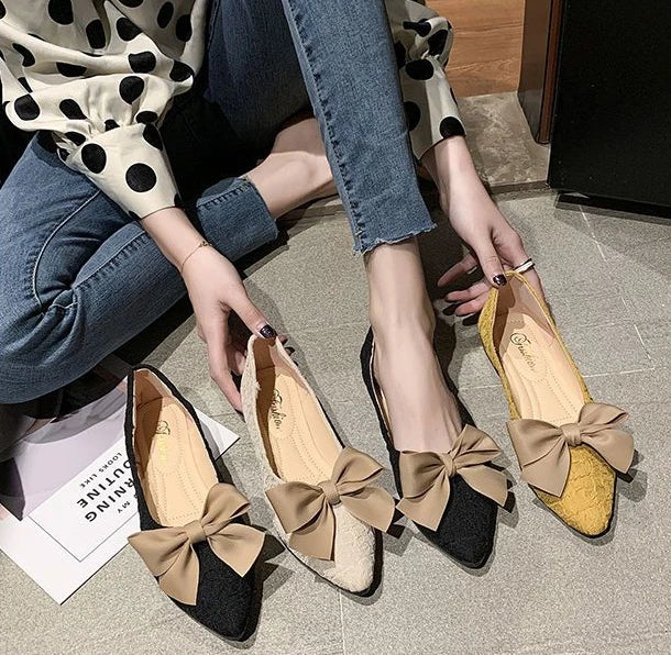 butterfly-knot pointed vulcanized shoes