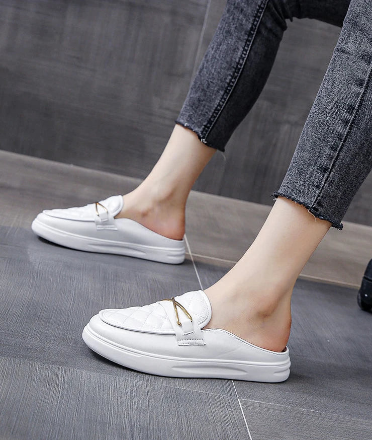 white flat leather slippers