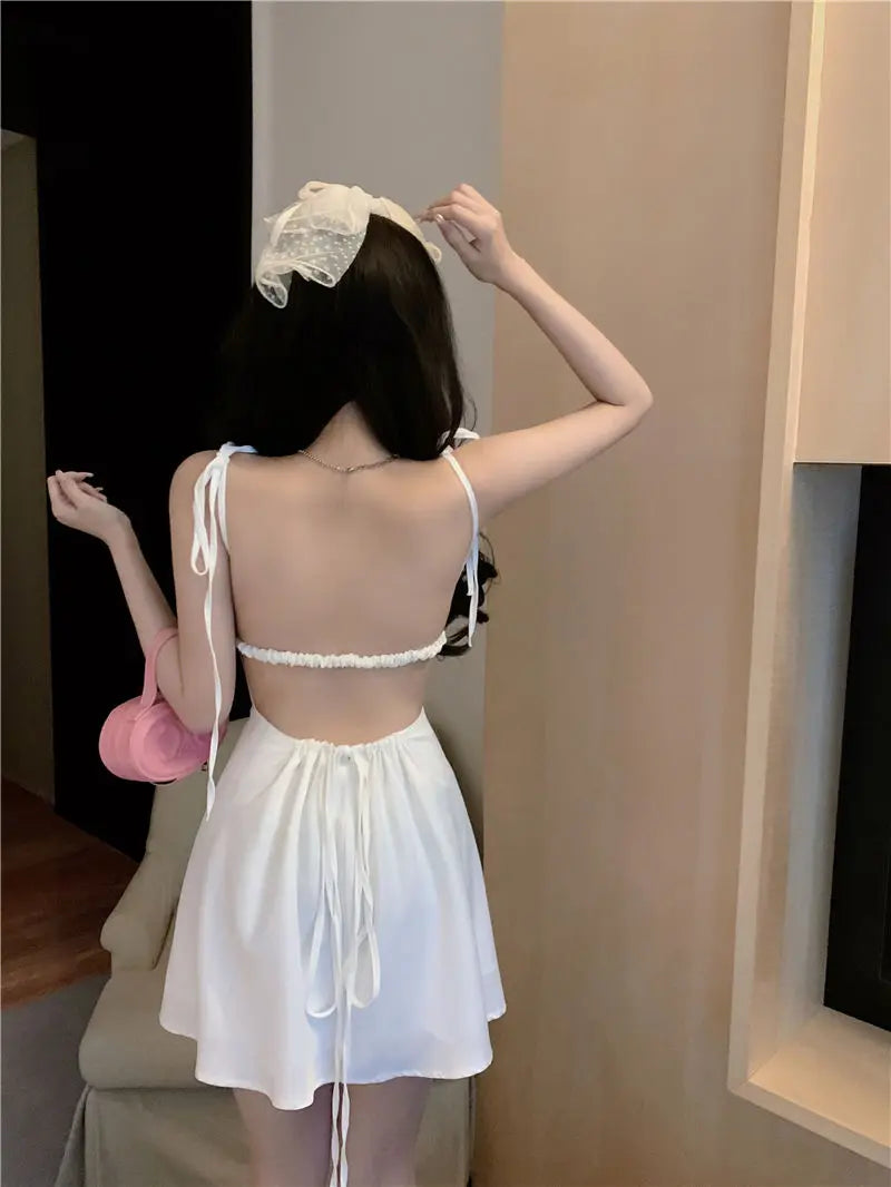 white sleeveless mini dresses