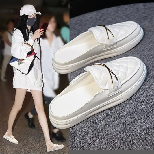 white flat leather slippers