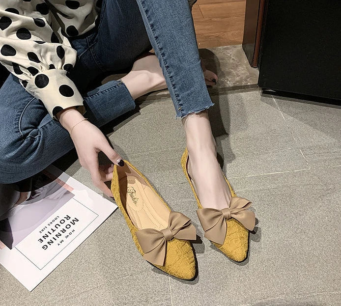 butterfly-knot pointed vulcanized shoes