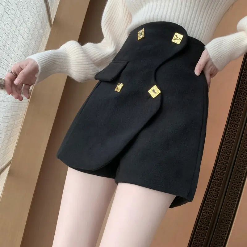 asymmetrical golden buttons shorts