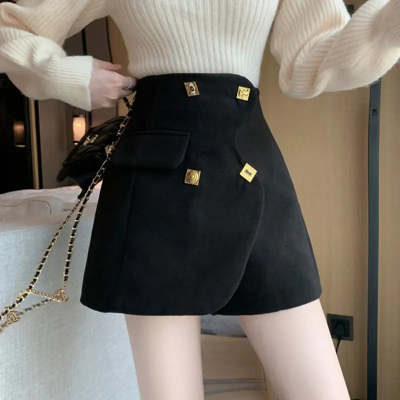 asymmetrical golden buttons shorts