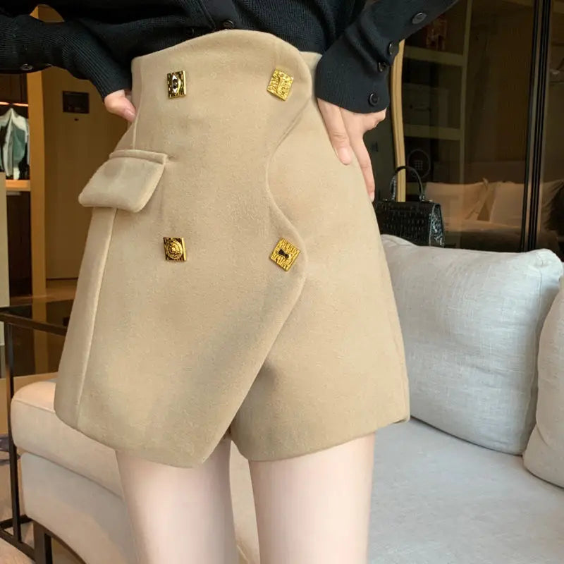 asymmetrical golden buttons shorts