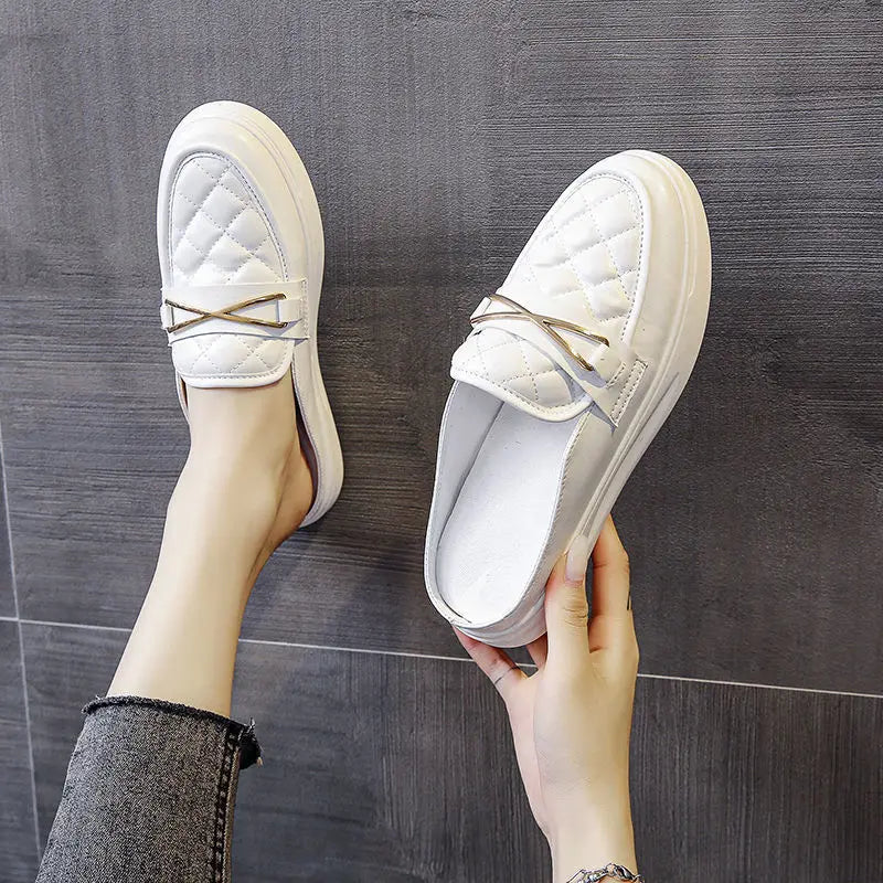 white flat leather slippers