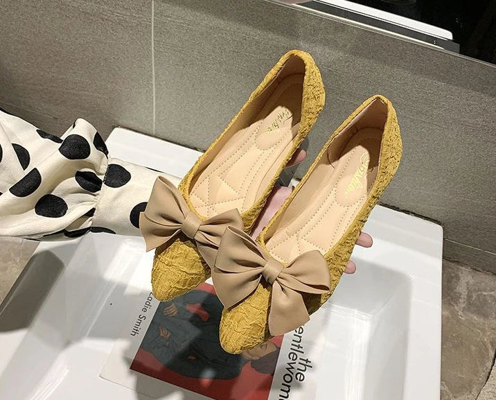 butterfly-knot pointed vulcanized shoes